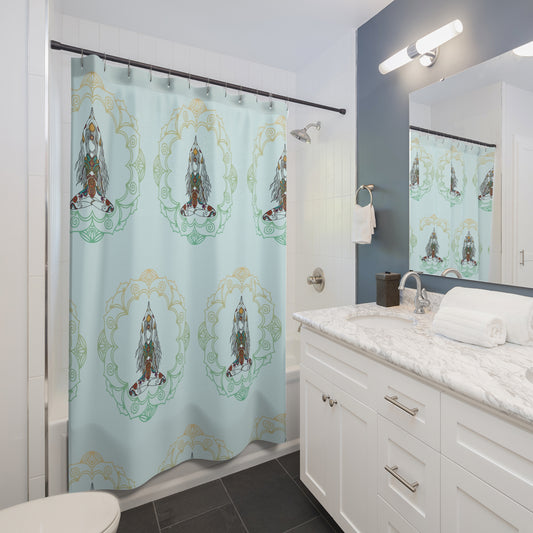Bathroom with a shower curtain featuring a decorative design, white vanity, and mirror.