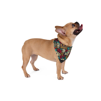 Dog wearing a black bandana with white patterns on a white background