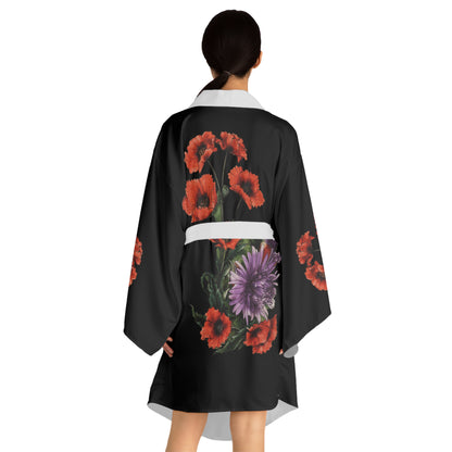 Black kimono with floral designs on a white background