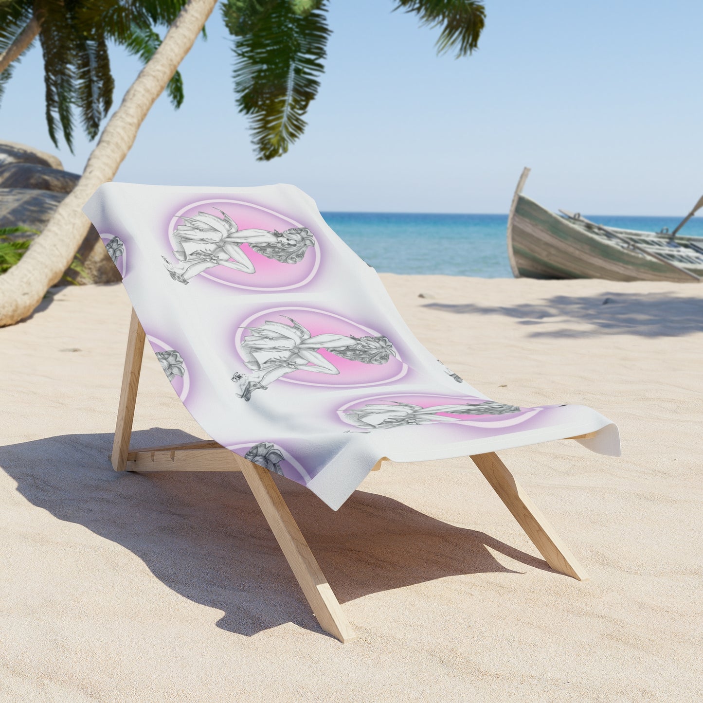 Beach towel with pink and green design on a wooden chair on a sandy beach with palm trees and ocean in the background.