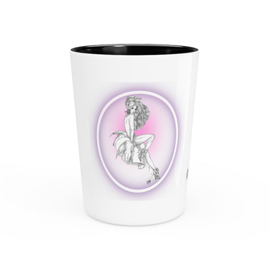 White shot glass with black interior, featuring a graphic of a woman sitting on a cloud with a purple halo.