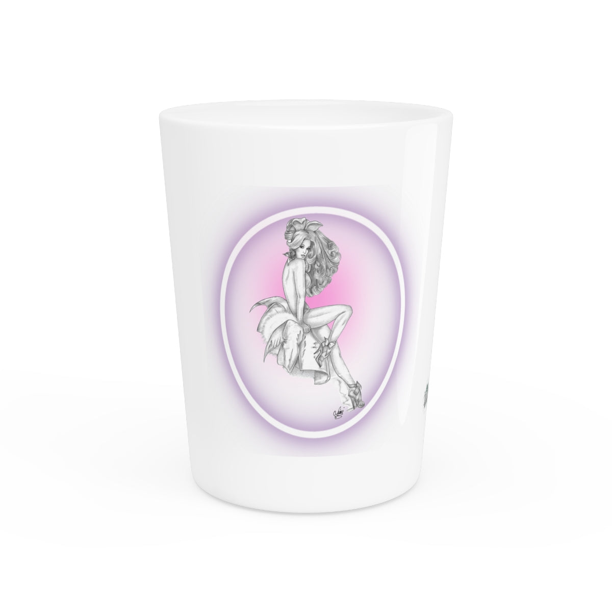 White shot glass with a decorative design of a woman on a pink background